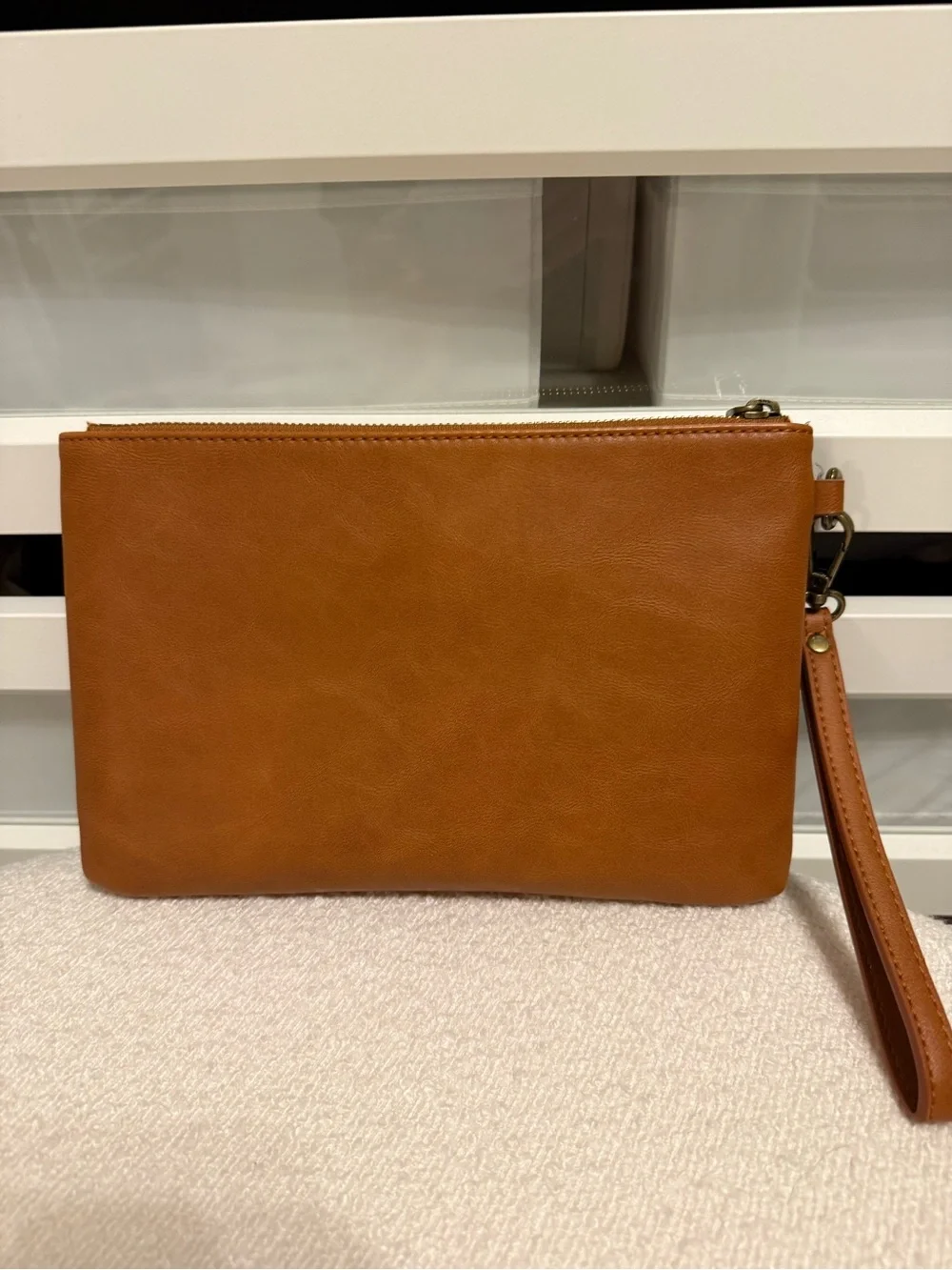 Milkmaid Goods camel colored wristlet clutch